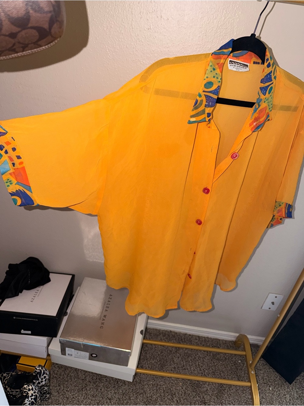 Mango colored sheer blouse